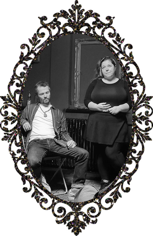 Anki from improvshine on stage near a sitting person